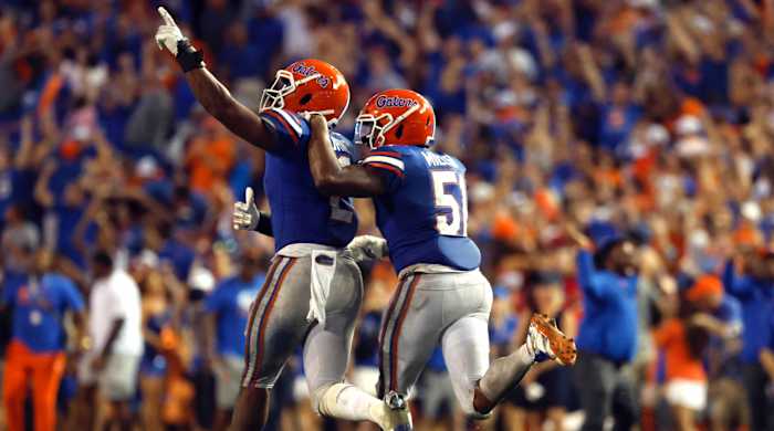 Florida Gators linebacker Amari Burney (2) celebrates with linebacker Ventrell Miller (51) after he intercepted the ball against the Utah Utes during the second half at Steve Spurrier-Florida Field.